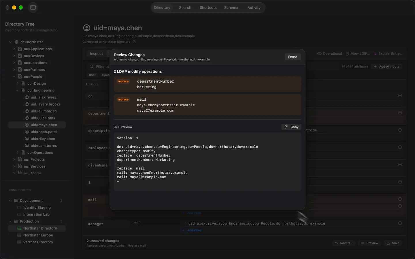 Marten’s dark Review Changes sheet previews updating Maya Chen’s department to Marketing and adding a second email address.